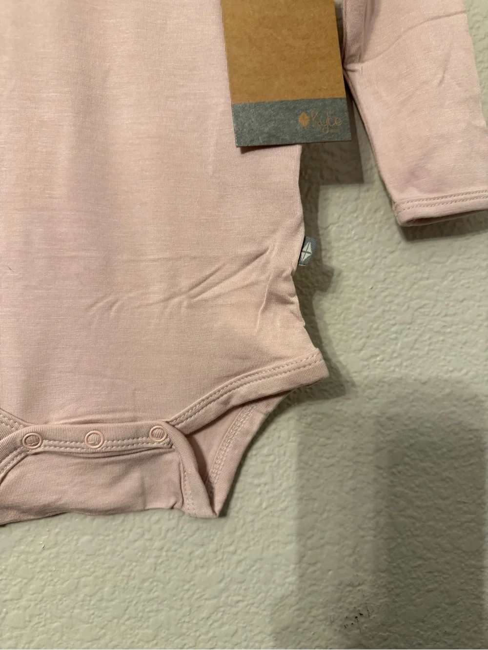 Kyte BABY Long-Sleeve One-Piece Bodysuit in Pale Pink